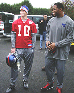 Eli Manning and Michael Strahan